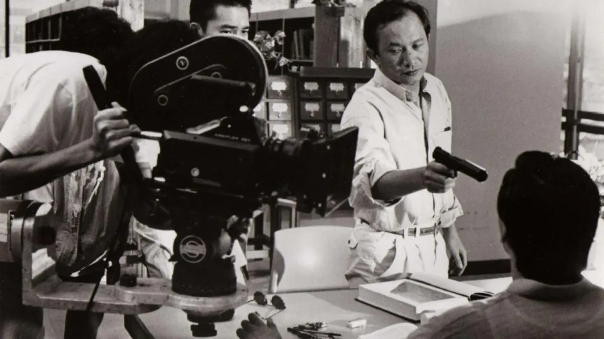 John Woo style action scene with doves, guns, and slow motion